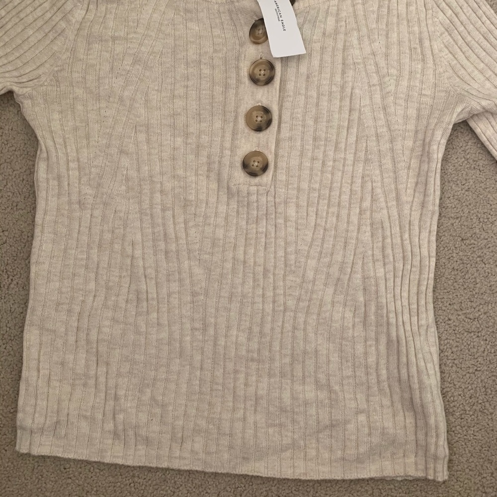 Adorable off white sweater with super cute buttons
